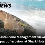 Coastal Zone Management viewing impact of Shark Hole erosion