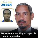 Attorney Andrew Pilgrim urges his client to surrender